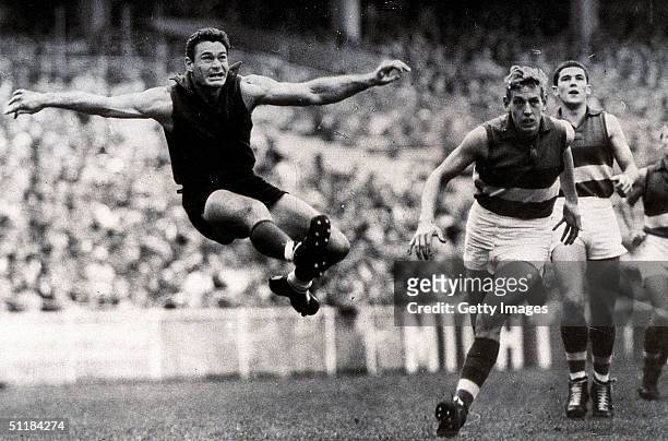 Ron Barassi of the Melbourne Demons in action during a VFL match held in Melbourne, Australia.