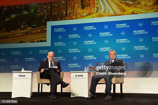 Ali Bin Ibrahim al-Naimi, Saudi Arabia's petroleum and mineral resources minister, right, speaks as Daniel Yergin, vice chairman of IHS Cambridge...