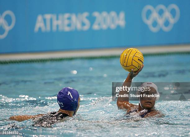 Cora Campbell of Canada in action against Brenda Villa of USA in the women's Water Polo preliminary game on August 18, 2004 during the Athens 2004...