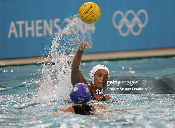 Ann Dow of Canada in action against Brenda Villa of USA in the women's Water Polo preliminary game on August 18, 2004 during the Athens 2004 Summer...