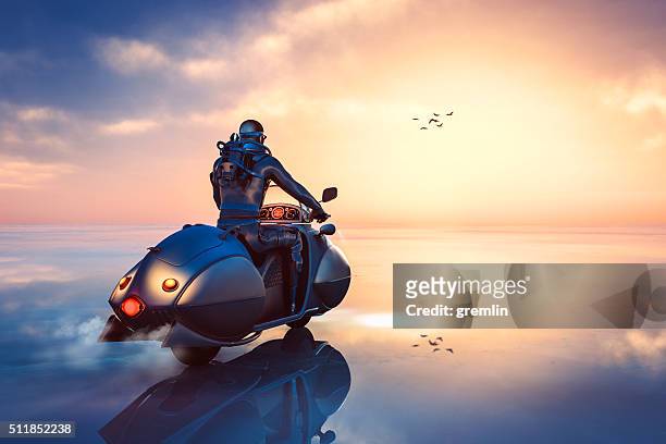 stempunk biker driving through frozen fantasy landscape - fantasy warrior stock pictures, royalty-free photos & images