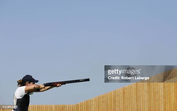 Kimberley Rhode of the USA competes during the women's double trap qualifying event on August 18, 2004 during the Athens 2004 Summer Olympic Games at...