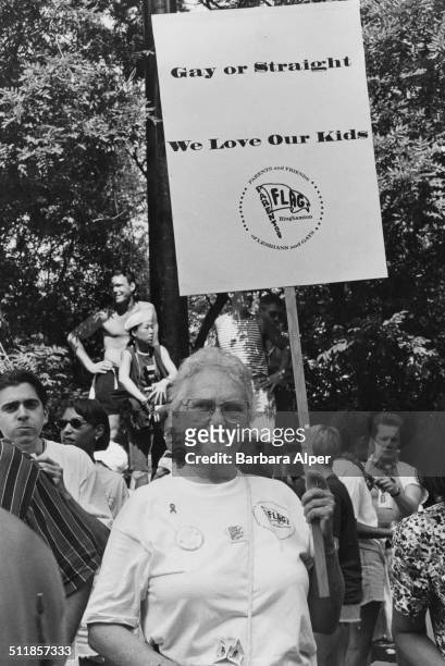 March to commemorate the 25th anniversary of the Stonewall Riots, New York City, USA, 26th June 1994. A member of FLAG, the Parents and Friends of...
