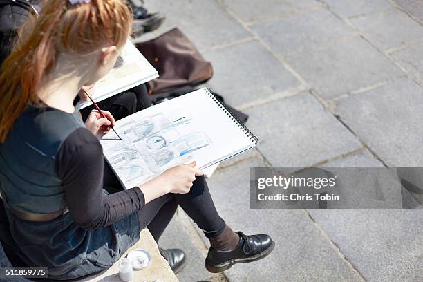 young student with sketchbook notre dame paris - sketch young woman stock pictures, royalty-free photos & images