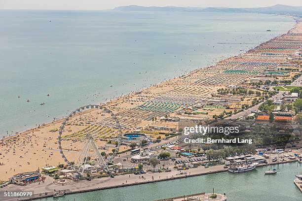 aerial view of the crowded beach of rimini - rimini ストックフォトと画像