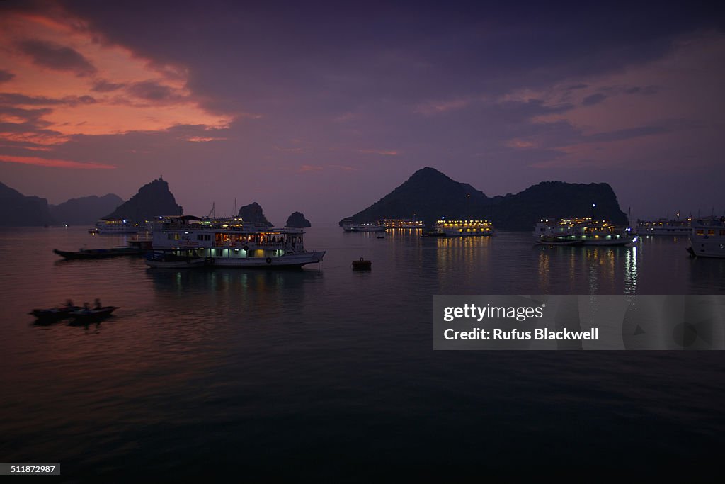 Lights of houseboats at Ha Long Bay