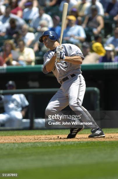 Center fielder Brady Clark of the Milwaukee Brewers bats during the MLB game against the Colorado Rockies at Coors Field on July 1, 2004 in Denver,...