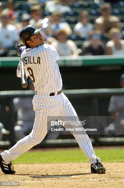 Third baseman Vinny Castilla of the Colorado Rockies bats during the MLB game against the Milwaukee Brewers at Coors Field on July 1, 2004 in Denver,...