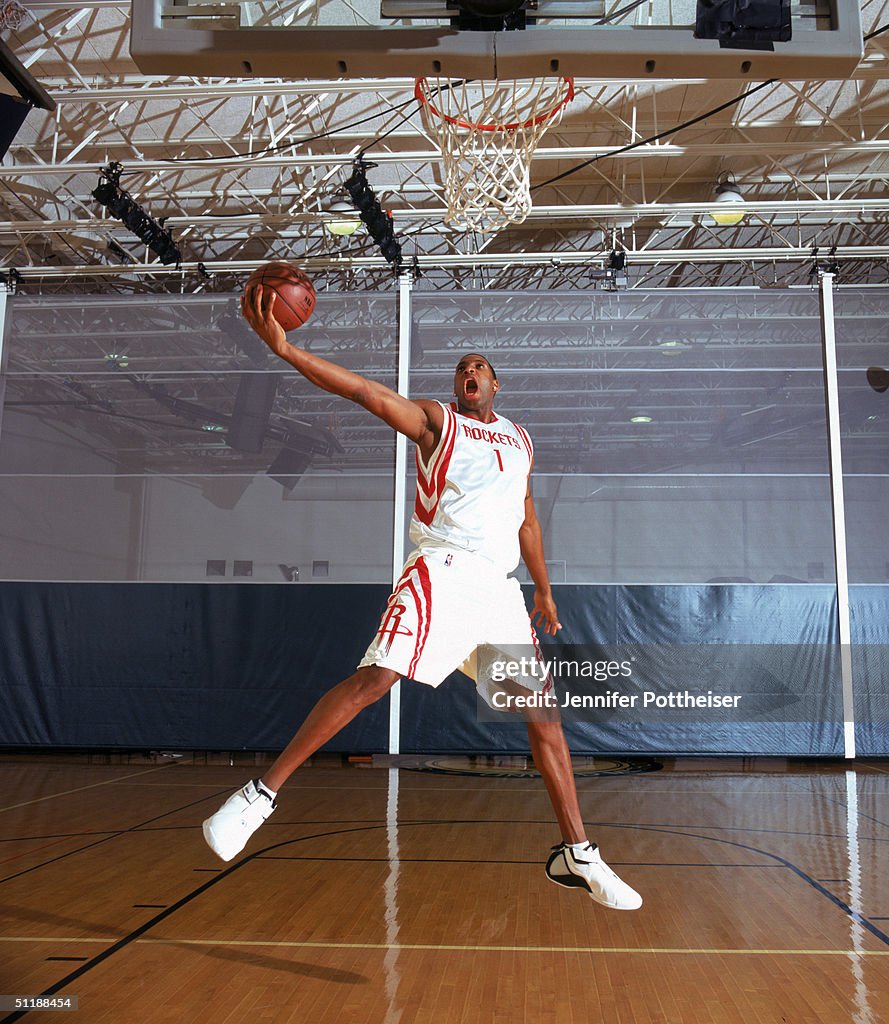 T Mac Rockets Tracy McGrady of the Houston Rockets goes for a layup for an action ...
