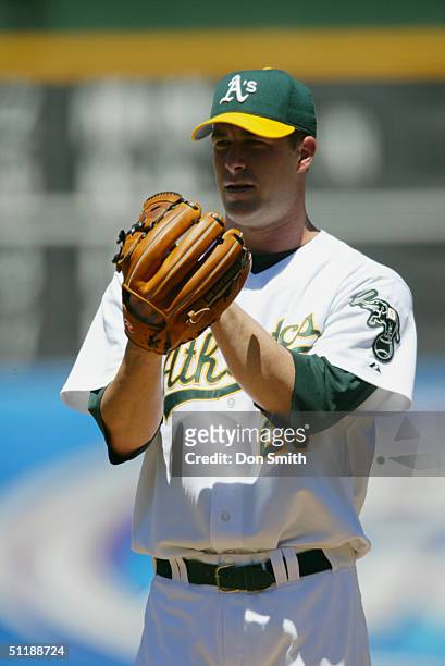 Mark Mulder of the Oakland A's pitches during the MLB game against the Chicago White Sox at the Network Associates Coliseum on July 18, 2004. The A's...