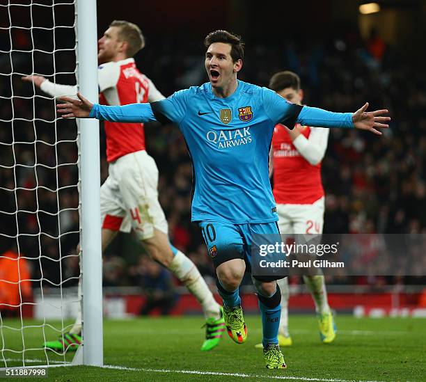 Lionel Messi of Barcelona celebrates after scoring the opening goal during the UEFA Champions League round of 16 first leg match between Arsenal and...