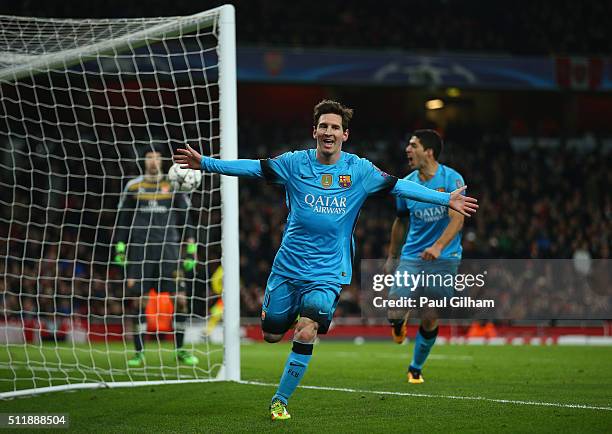 Lionel Messi of Barcelona celebrates after scoring his second goal during the UEFA Champions League round of 16 first leg match between Arsenal and...