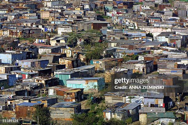 This undated file photo shows a view of the shacks which sprawl over the hill-side in Duncan Village, East London. Approximately seven million South...