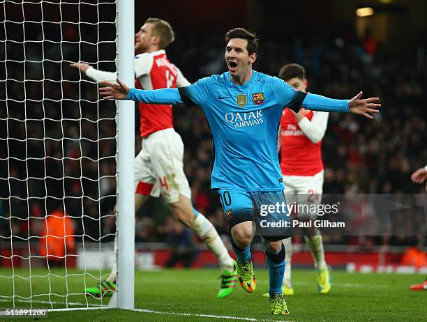 Lionel Messi of Barcelona celebrates after scoring the opening goal during the UEFA Champions League round of 16 first leg match between Arsenal and...