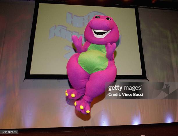 Barney the dinosaur performs during the Hollywood Radio and Television Society's 10th Annual Kids Day 2004 show on August 18, 2004 at Hollywood and...