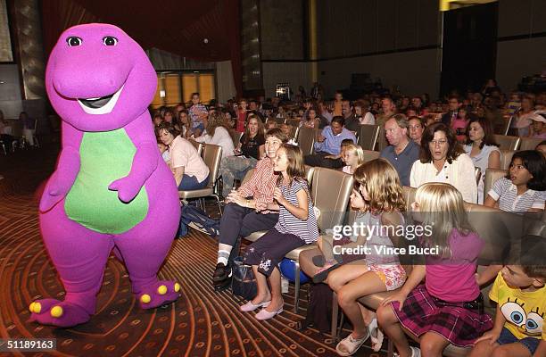 Barney the dinosaur greets the audience during the Hollywood Radio and Television Society's 10th Annual Kids Day 2004 show on August 18, 2004 at...