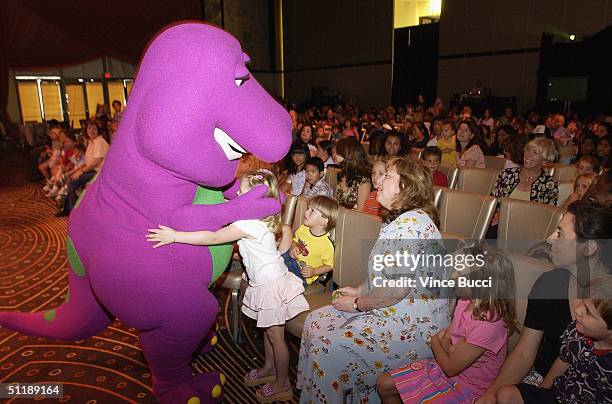 Barney the dinosaur greets the audience during the Hollywood Radio and Television Society's 10th Annual Kids Day 2004 show on August 18, 2004 at...