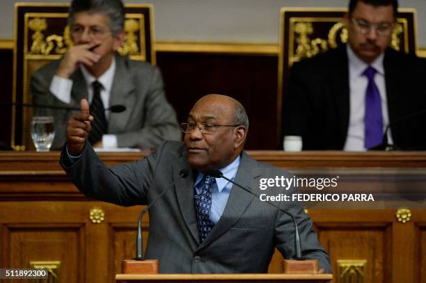 Venezuela's Vice-President Aristobulo Isturiz gestures as he presents the annual report to the National Assembly in Caracas on February 23, 2016....