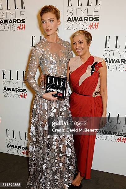 Arizona Muse, winner of the Fashion Director's Woman of the Year award, and Anne-Marie Curtis pose in the winners room at The Elle Style Awards 2016...