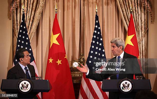 Secretary of State John Kerry and Chinese Foreign Minister Wang Yi participate in a joined news conference at the State Department February 23, 2016...