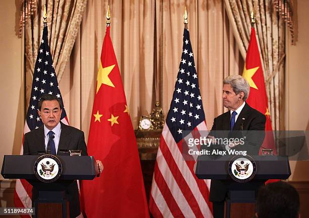 Secretary of State John Kerry and Chinese Foreign Minister Wang Yi participate in a joined news conference at the State Department February 23, 2016...