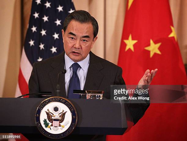 Chinese Foreign Minister Wang Yi participates in a joined news conference with U.S. Secretary of State John Kerry at the State Department February...