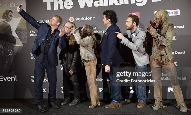 Michael Cudlitz, Greg Nicotero, Josh McDermitt and Ross Marquand attend the 'The Walking Dead' fan event at Callao Cinema on February 23, 2016 in...