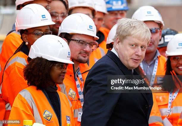 Mayor of London Boris Johnson meets Crossrail construction workers as he awaits the arrival of Queen Elizabeth II for a visit to the Crossrail...