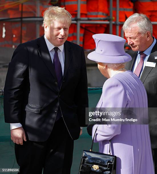 Mayor of London Boris Johnson greets Queen Elizabeth II as she arrives for a visit to the Crossrail station site at Bond Street on February 23, 2016...