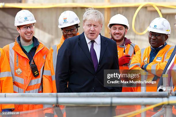 Mayor of London Boris Johnson meets Crossrail construction workers as he awaits the arrival of Queen Elizabeth II for a visit to the Crossrail...