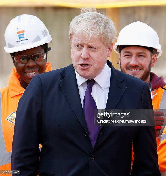 Mayor of London Boris Johnson meets Crossrail construction workers as he awaits the arrival of Queen Elizabeth II for a visit to the Crossrail...