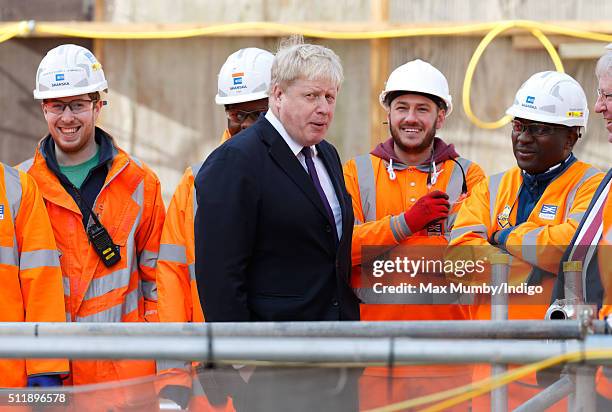 Mayor of London Boris Johnson meets Crossrail construction workers as he awaits the arrival of Queen Elizabeth II for a visit to the Crossrail...