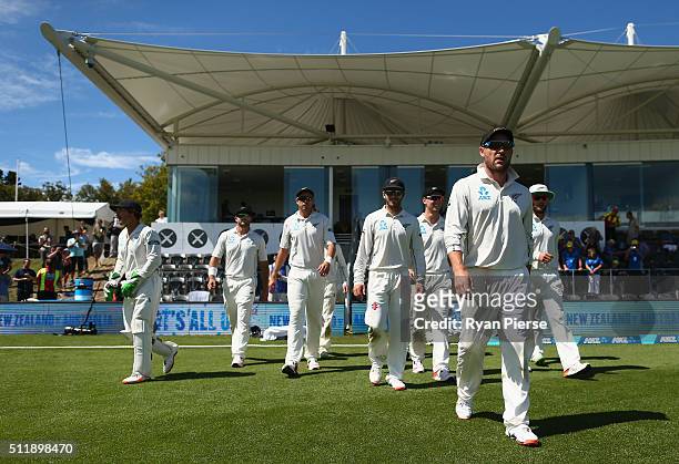 Brendon McCullum of New Zealand leads his team out during his final day of test cricket during day five of the Test match between New Zealand and...