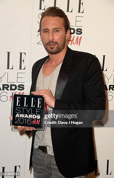 Matthias Schoenaerts poses with his award for Actor of The Year in the winners room at The Elle Style Awards 2016 at tate britain on February 23,...