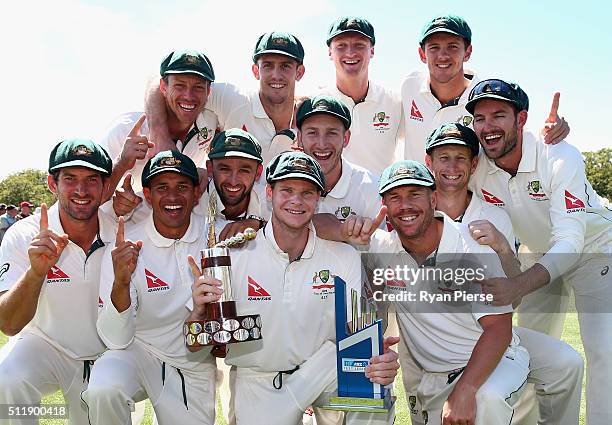 The Australian Team celebrate with Trans Tasman Trophy during day five of the Test match between New Zealand and Australia at Hagley Oval on February...