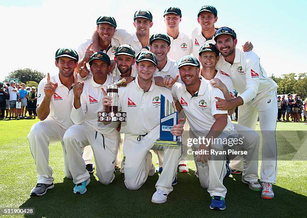 The Australian Team celebrate with Trans Tasman Trophy during day five of the Test match between New Zealand and Australia at Hagley Oval on February...