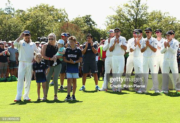 Brendon McCullum of New Zealand and his family look on during the presentation after his final test during day five of the Test match between New...