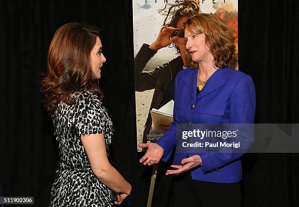 Actress Tina Fey talks with the Under Secretary of the Air Force Lisa Disbrow at the "Whiskey Tango Foxtrot" Washington DC Screening at Burke Theater...