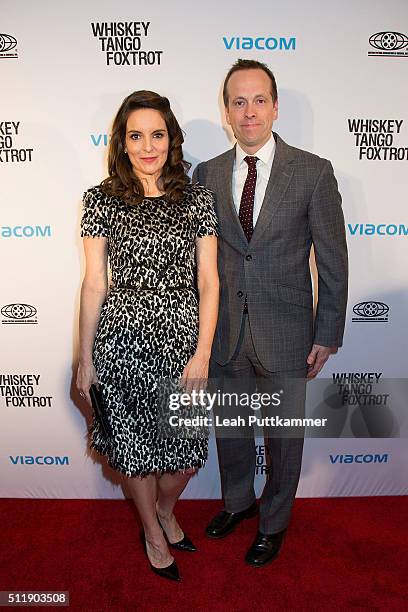 Actress Tina Fey and screenwriter Robert Carlock attend the "Whiskey Tango Foxtrot" Screening at the Burke Theater at The U.S. Navy Memorial on...