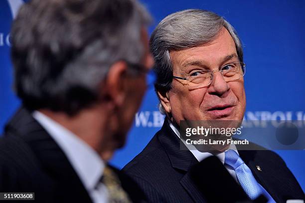 Former senators Tom Daschle, left, and Trent Lott, right, , discuss their new book, Crisis Point, at SiriusXM-Bipartisan Policy Center's event hosted...