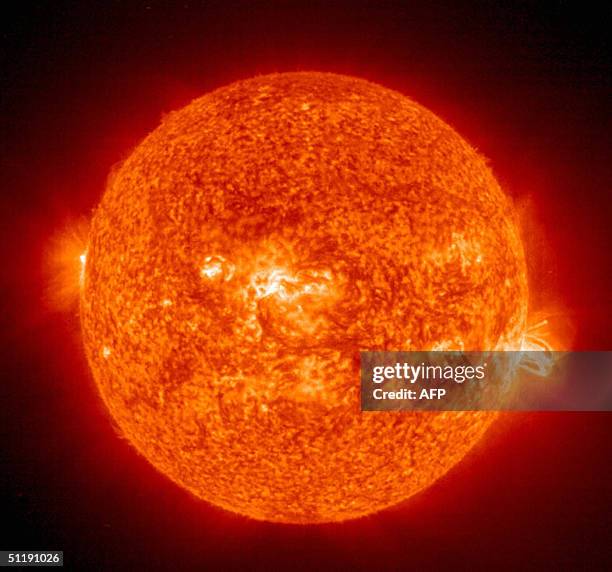 This 19 August, 2004 NASA Solar and Heliospheric Administration image shows a solar flare erupting from giant sunspot 649. The powerful explosion...