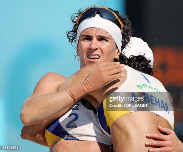 Shelda Brazil's Shelda Bede is hugged by teammate Adriana Behar after... News ...