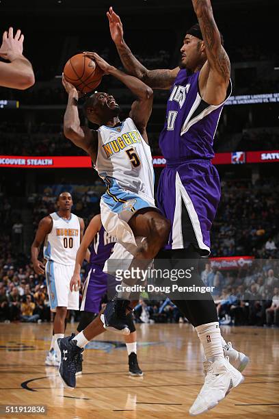 Will Barton of the Denver Nuggets goes up for a shot and is fouled by Willie Cauley-Stein of the Sacramento Kings at Pepsi Center on February 23,...