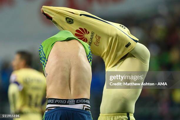 Clint Dempsey of the Seattle Sounders and Miguel Saudi of Club America swap shirts after the CONCACAF Champions League match between Seattle Sounders...