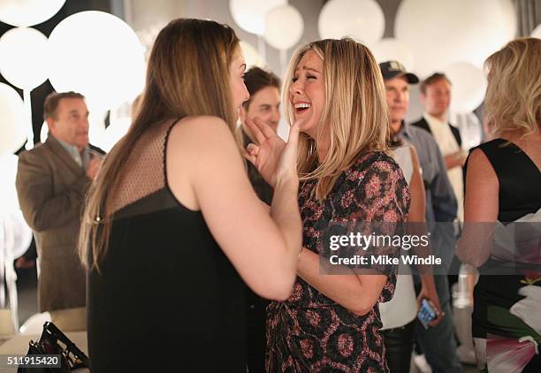 Comedian Whitney Cummings and actress Jennifer Aniston attends smartwater sparkling celebrates Jennifer Aniston and St Jude's Children's Hospital at...