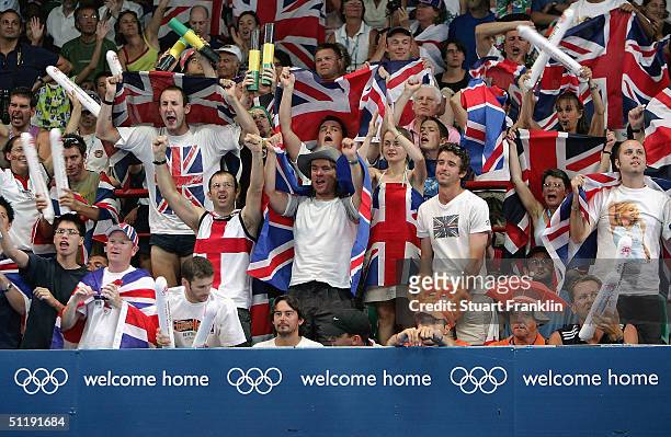The British fans cheer on Gail Emms and Nathan Robertson of Great Britain during their match against Jun Zhang and Ling Gao of China in the mixed...