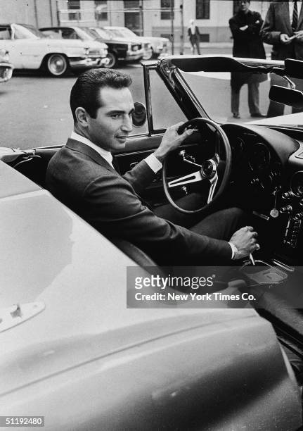 American baseball player Sandy Koufax of the Los Angeles Dodgers sits in the Corvette he received from Sports Illustrated magazine for his...