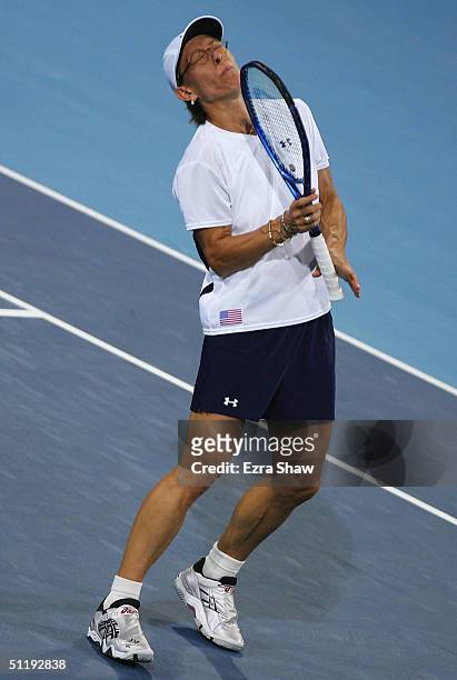 Martina Navratilova reacts during the women's doubles tennis quarterfinal against Shinobu Asagoe and Ai Sugiyama of Japan on August 19, 2004 during...