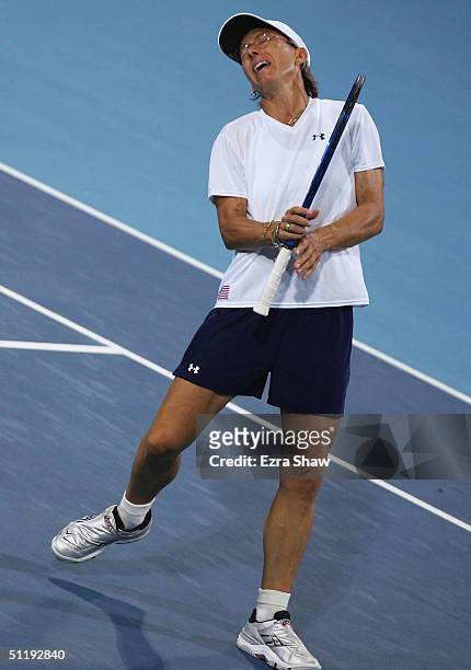 Martina Navratilova reacts during the women's doubles tennis quarterfinal against Shinobu Asagoe and Ai Sugiyama of Japan on August 19, 2004 during...