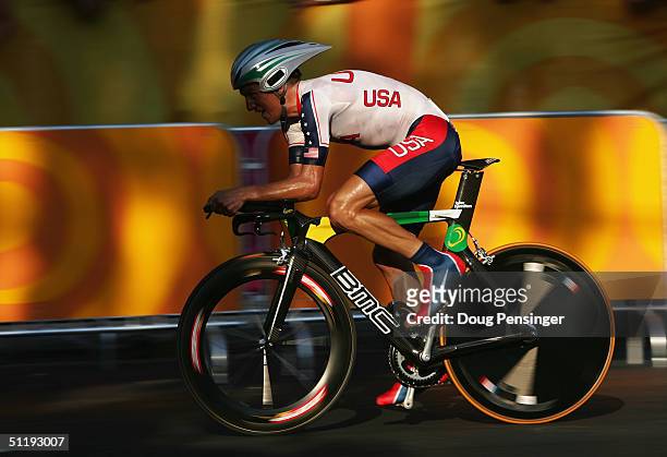 Tyler Hamilton of the USA rides in the men's road cycling individual time trial on August 18, 2004 during the Athens 2004 Summer Olympic Games at the...